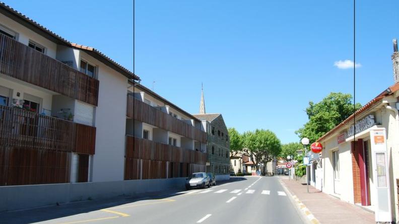 Construction de logements collectifs récents en centre-ville, utilisation qualitative du bois - Arès