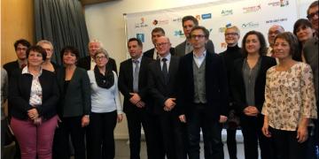 Photo de groupe des 13 signataires