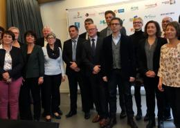 Photo de groupe des 13 signataires